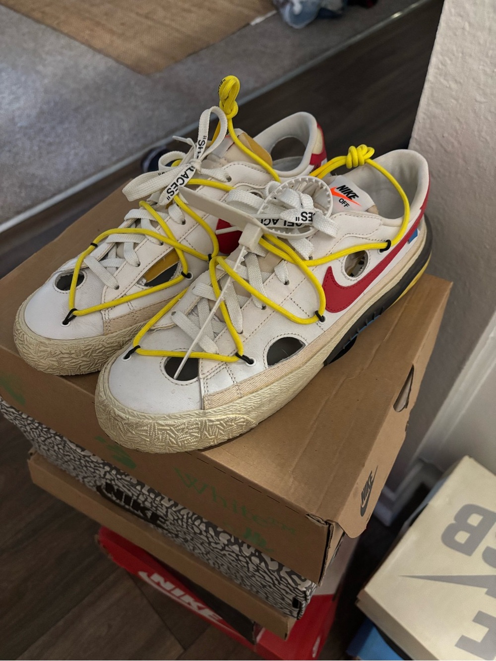 Nike  White Sneakers with Red Swoosh and Yellow Laces